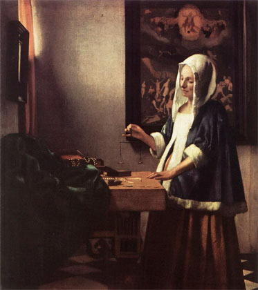 Woman Weighing Gold