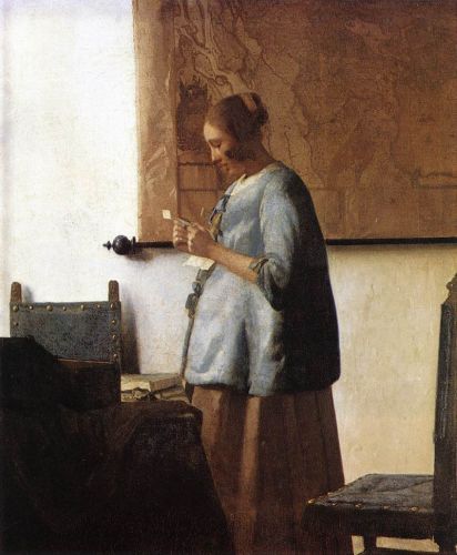 Woman in Blue Reading a Letter