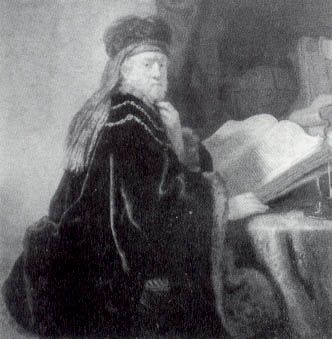 A Scholar Seated At A Desk