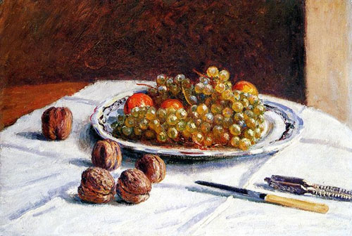 Grapes and Walnuts on a Table